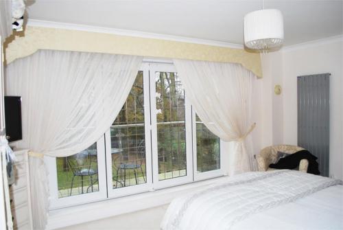 На кухню шторы из органзы. Разновидности материала 11