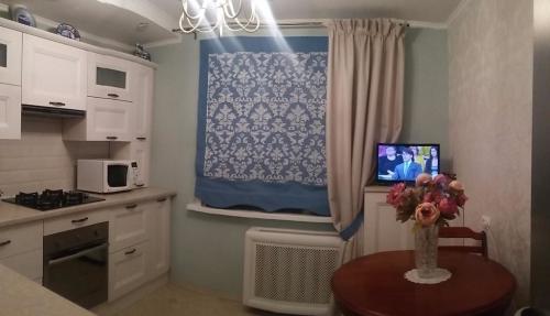 Дизайн занавесок на кухню. Какие шторы можно выбрать для кухни