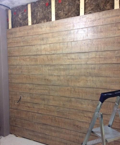 Изголовье кровати из ламината. Отделка стены ламинатом