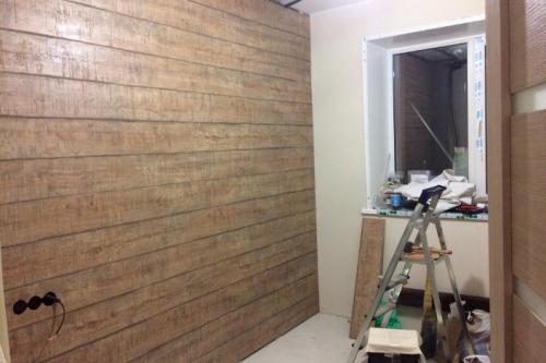 Изголовье кровати из ламината. Отделка стены ламинатом