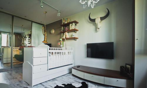 Дизайн однокомнатной квартиры с новорожденным. Как зонировать квартиру студию к рождению малыша?