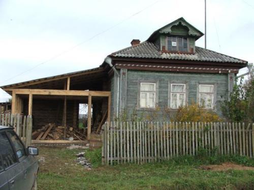 Гараж перед домом с односкатной крышей. Варианты односкатной крыши гаража