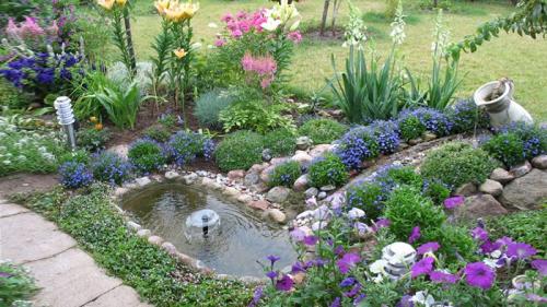 Клумба своими руками из подручных материалов. Виды