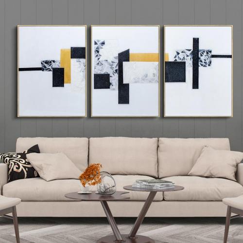 Декорирование стены над диваном. Картины