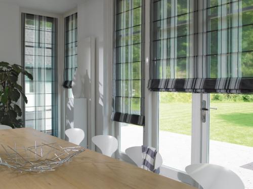 Как выбрать красивые шторы для гостиной в современном стиле 19 Как выбрать красивые шторы для гостиной в современном стиле 19