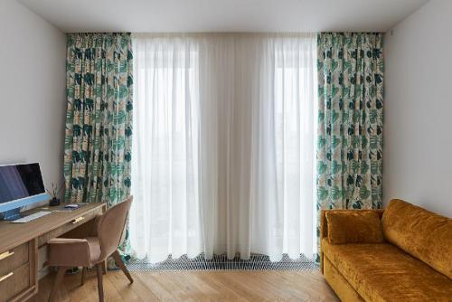 Как выбрать элегантные и необычные шторы для гостиной: советы дизайнера 14 Как выбрать элегантные и необычные шторы для гостиной: советы дизайнера 14