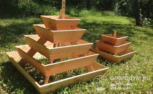 Клумба пирамида из досок. Виды многоярусных грядок