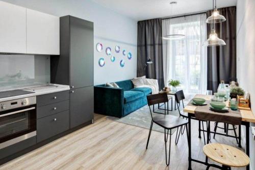 Как можно создать эффектный дизайн кухни-гостиной с использованием мебели. Материалы и оформление