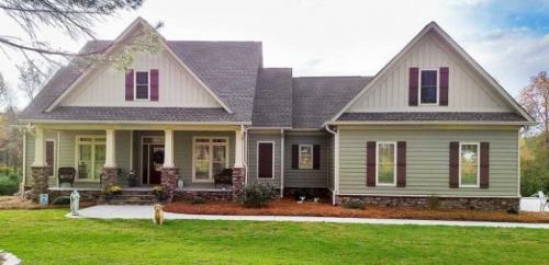 Дизайн фасада частного дома снаружи. Монтаж фасадного покрытия из натурального камня 10