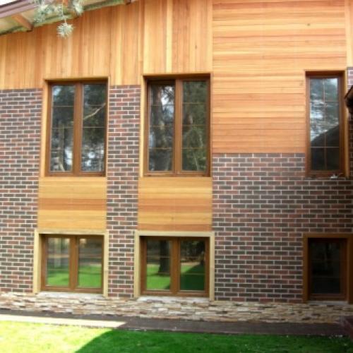 Дизайн фасада частного дома снаружи. Монтаж фасадного покрытия из натурального камня 14