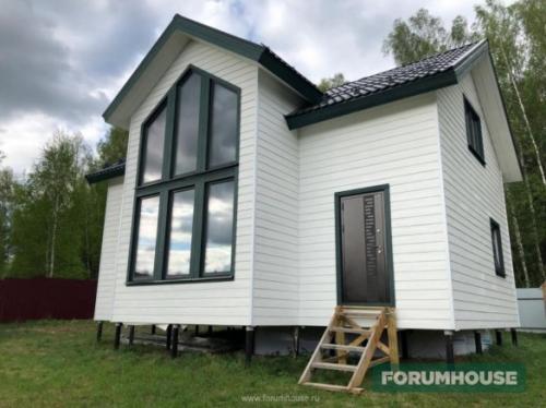 Чем обшить дом снаружи дешево и красиво. Сайдинг