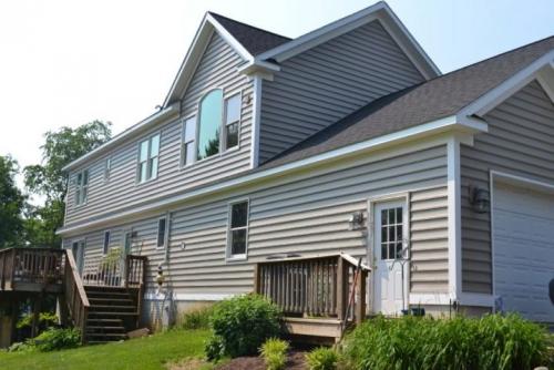 Чем дешево обшить дом снаружи. Виниловый сайдинг 08