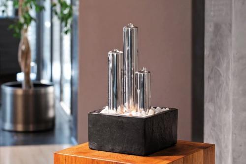 Как сделать вечный фонтан. Как заставить течь воду без постороннего вмешательства 03