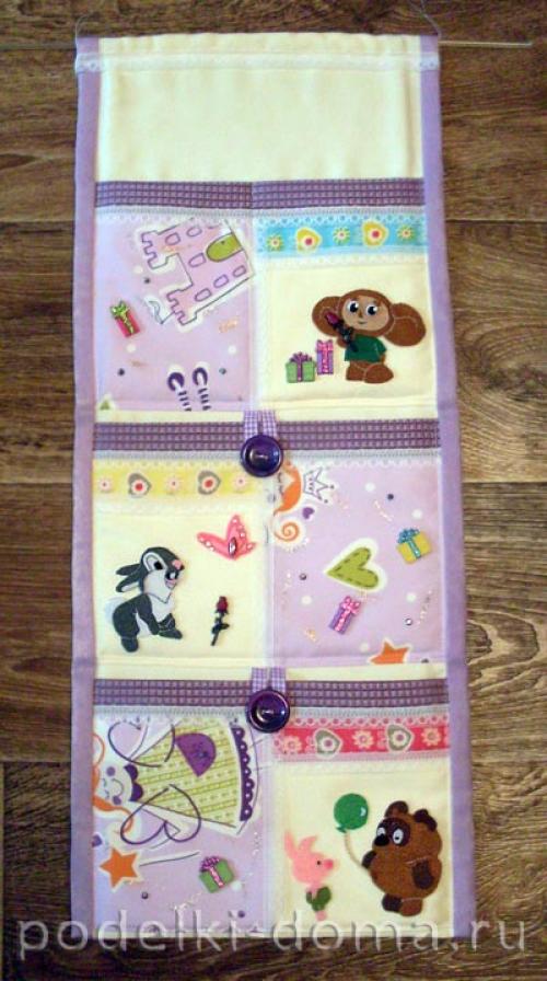 Кармашки на дверцу шкафчика для детского. Как сделать самому 01