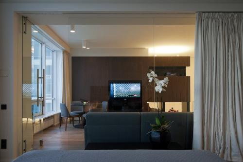 Идеи для создания функционального разделения кухни и жилой зоны в студии 07