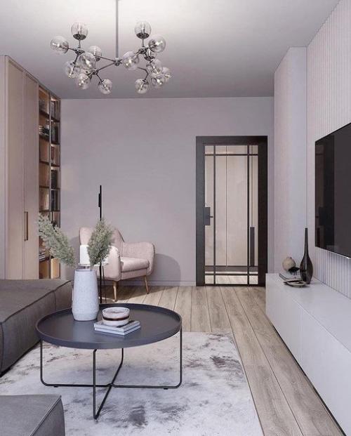 Красивый интерьер квартиры выполнен проект в светлых тонах с лёгкими нотками розового цвета и уютными деталями. 08