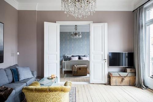 Эта прекрасная квартира находится в столице Швеции Стокгольме, в здании 1903 года постройки. 01