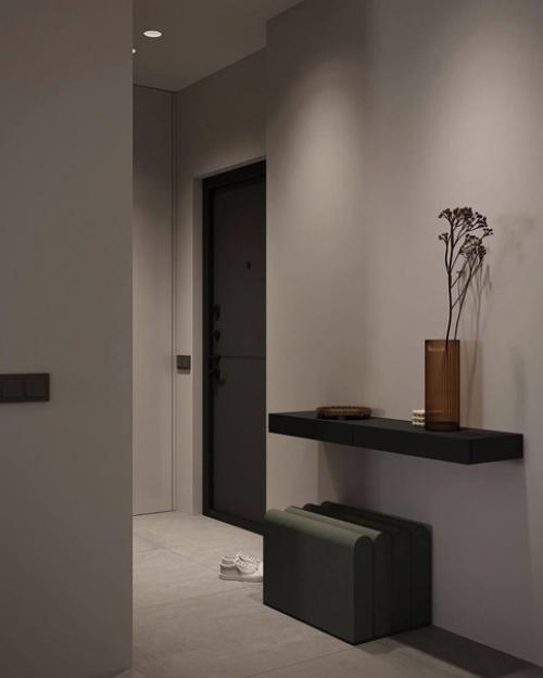 Интерьер, в котором нет ничего лишнего, нет каких-то ярких вещей, которые портили бы красивый дизайн квартиры. 08