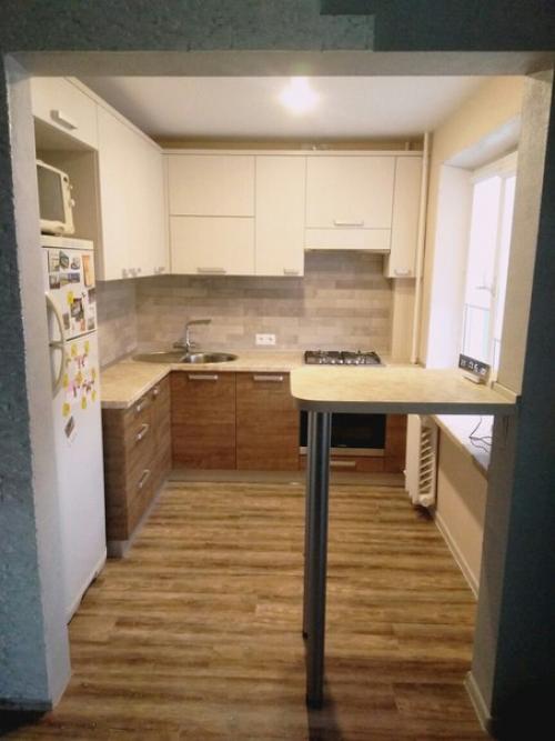 Полезные советы. Объединение кухни и гостиной - это решение, позволяющее максимально эффективно использовать каждый квадратный метр двух комнат. 07