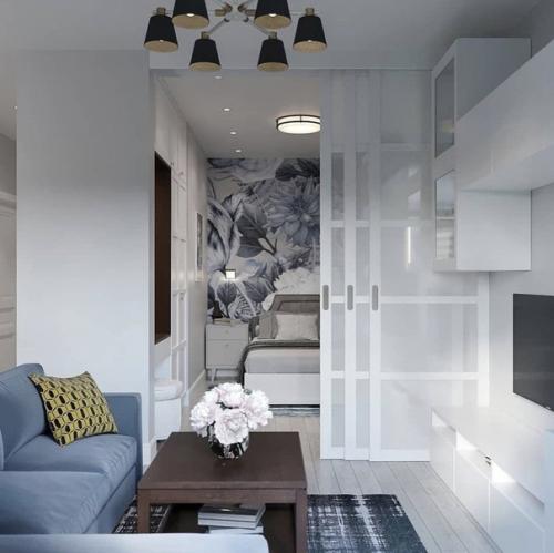 Стильный вариант дизайна небольшой квартиры в светлых тонах с интересными голубыми акцентами. 03