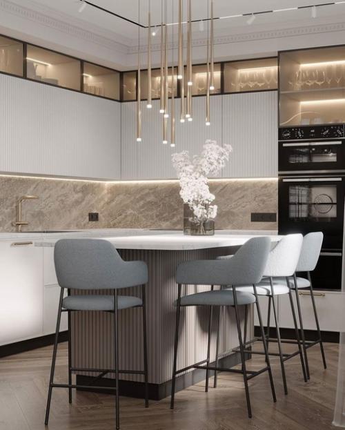 Классика в современном исполнении в этой кухне - гостиной будет актуальна очень долгое время. 05