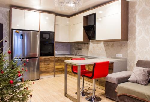 Полезные советы. Объединение кухни и гостиной - это решение, позволяющее максимально эффективно использовать каждый квадратный метр двух комнат. 04