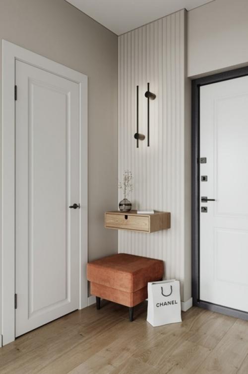 Проект квартиры площадью 40 квадратных метров, созданный для современной девушки, представляет собой уютное и изящное пространство. 04