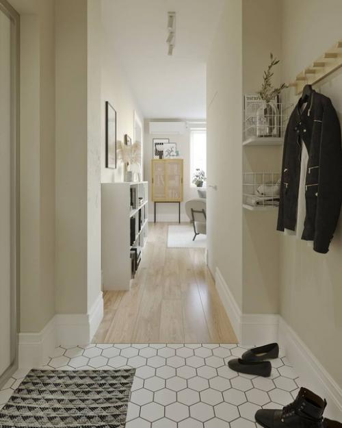 Интерьер прихожей. В этом проекте в грязной зоне используются белые гексагоны с темной затиркой. 02
