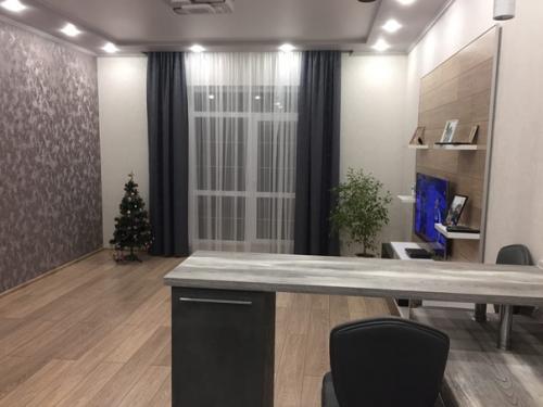 Вот такой вариант присоединения кухни к гостиной от нашего подписчика. 02