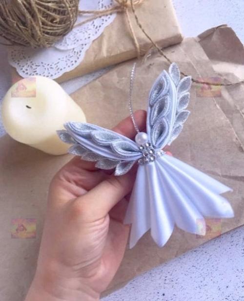 Этот ангел - отличный предмет новогоднего декора, может стать отличным подарком для ваших близких. 06