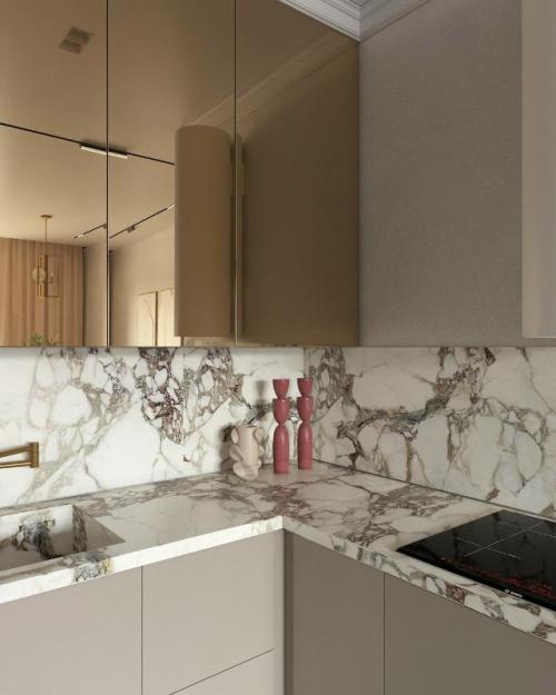 Интерьер небольшой кухни - гостиной выполнен в стильном современном стиле. 05