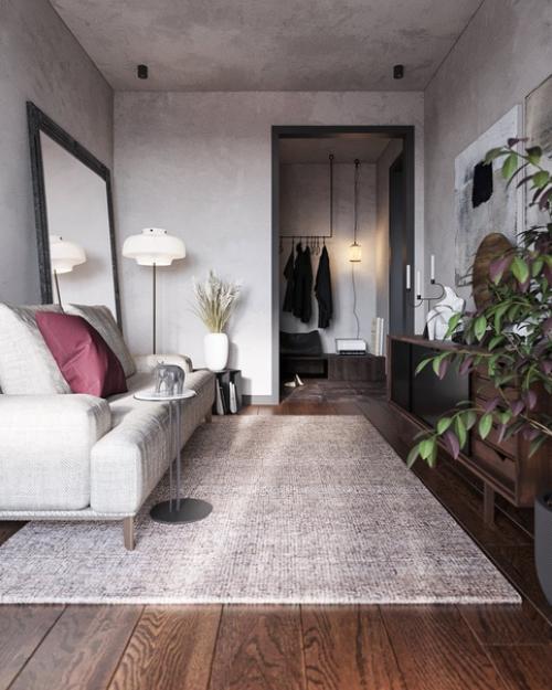 Черная кухня, отделка под бетон и металл, розовые акценты: однушка, способная поразить. 05