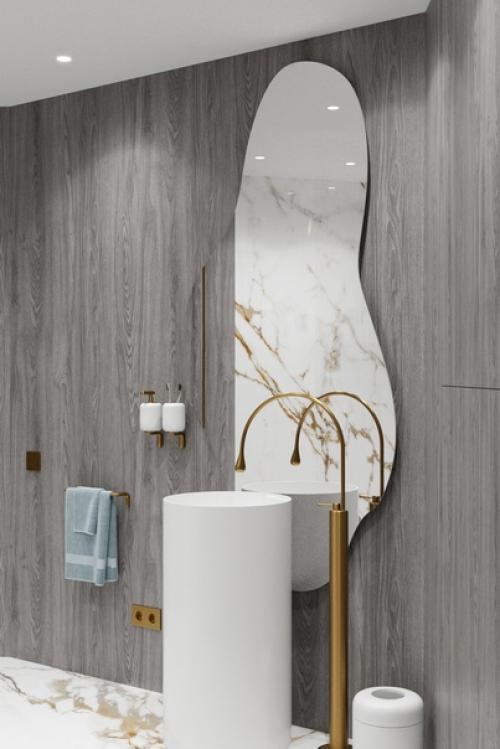 Это зеркало интересной формы превратит вашу ванную комнату в настоящий оазис роскоши и достатка. 01