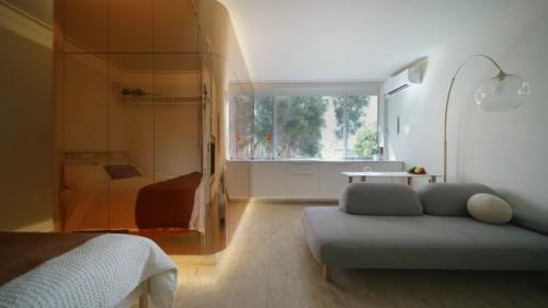 Оригинальный интерьер квартиры - студии 25 м 2 в Австралии. 01