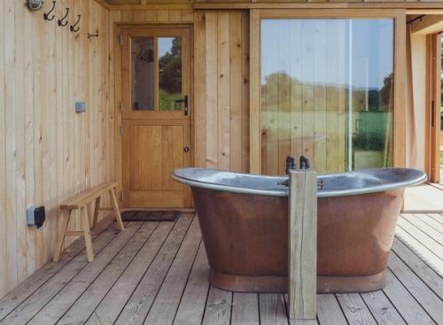 Домик Holly Water был построен в самом сердце Девона, Великобритания. 01