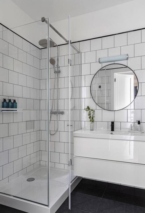 Эта квартира - образец традиционного сканди: дизайнер оформила интерьер в светлых тонах и добавила лаконичную мебель (65 кв. 07