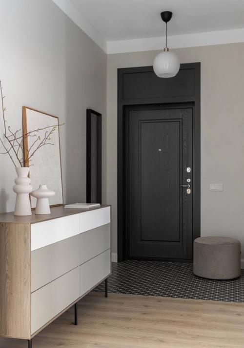 Эта квартира - образец традиционного сканди: дизайнер оформила интерьер в светлых тонах и добавила лаконичную мебель (65 кв. 08