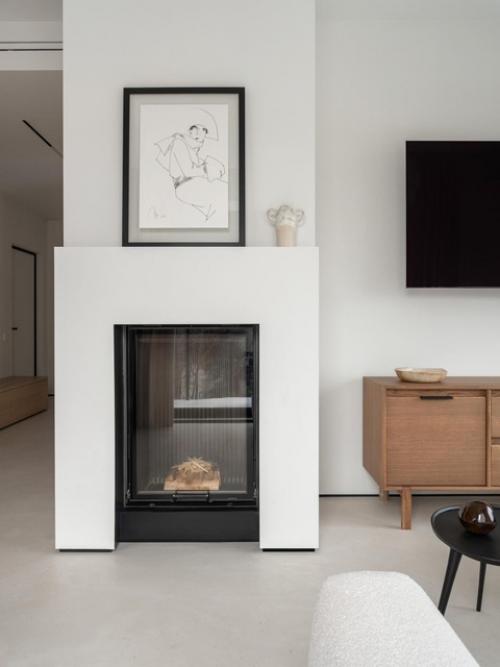 Реализованный интерьер двухуровневой квартиры в Москве с винтовой лестницей. 01