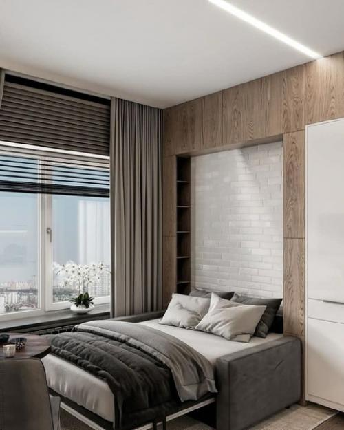 Интересное расположение кухни в студии и диван - кровать в таком маленьком пространстве единственное верное решение. 02