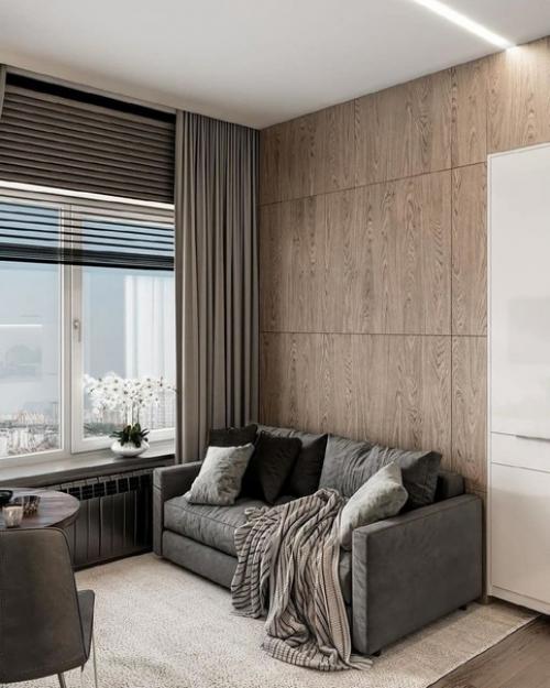 Интересное расположение кухни в студии и диван - кровать в таком маленьком пространстве единственное верное решение. 01