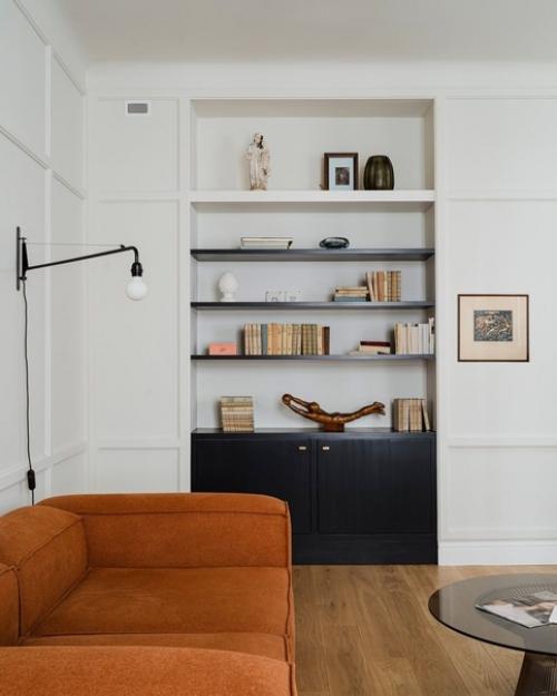 Дизайнер марта храпка в своем проекте объединила монохромные черно-белые оттенки с теплыми элементами светлого и темного дерева. 02