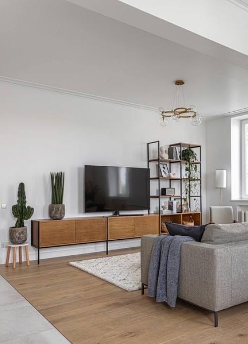 Лаконичный интерьер московской квартиры с элементами современной классики и мебелью в стиле mid - Century Modern. 01