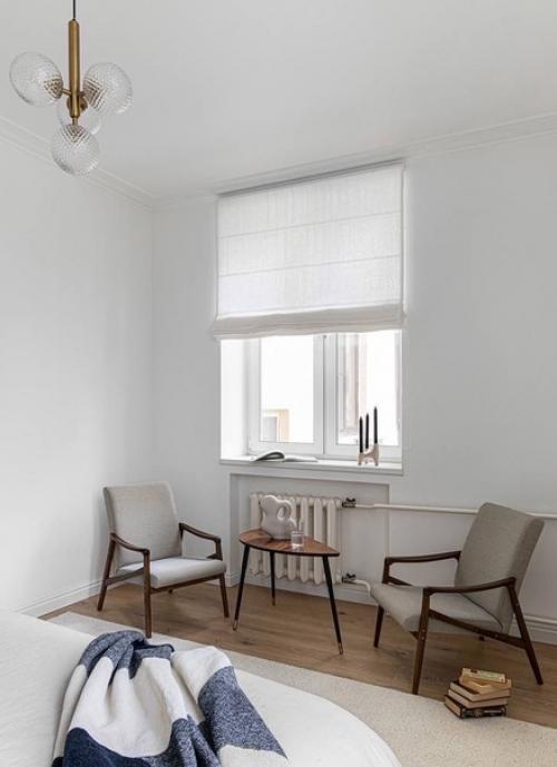 Лаконичный интерьер московской квартиры с элементами современной классики и мебелью в стиле mid - Century Modern. 07