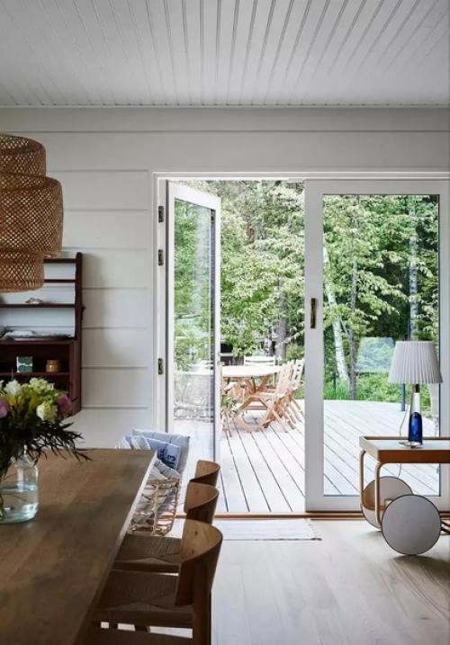 Интерьер этого летнего дома создан из сочетания старой унаследованной мебели и продуманных новых приобретений. 07