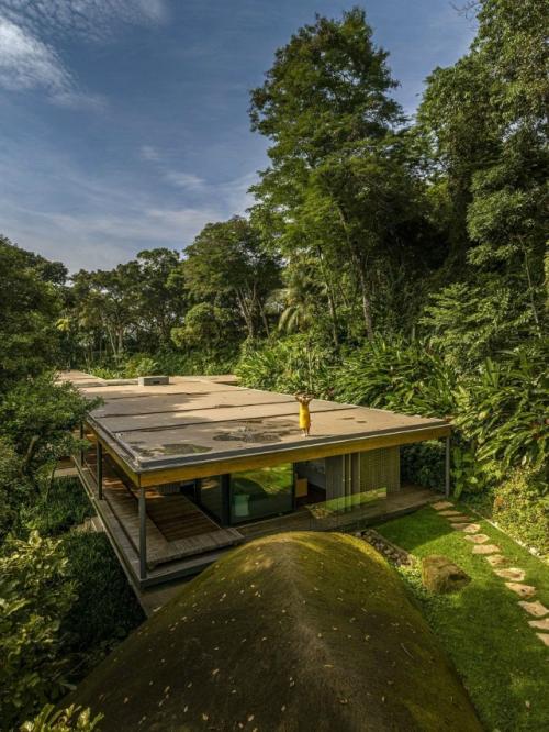 Дом на побережье Ангра - дус - рейс - яркий пример того, как архитектура может стать продолжением природы. 08