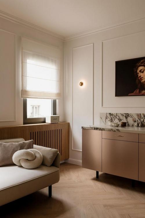 Интерьер этой небольшой квартиры - наглядный пример того, как даже в ограниченном пространстве можно создать атмосферу уюта и эстетики. 04