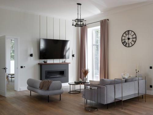 Двухэтажный загородный дом с уютной верандой - воплощение спокойствия, уюта и вкуса. 06