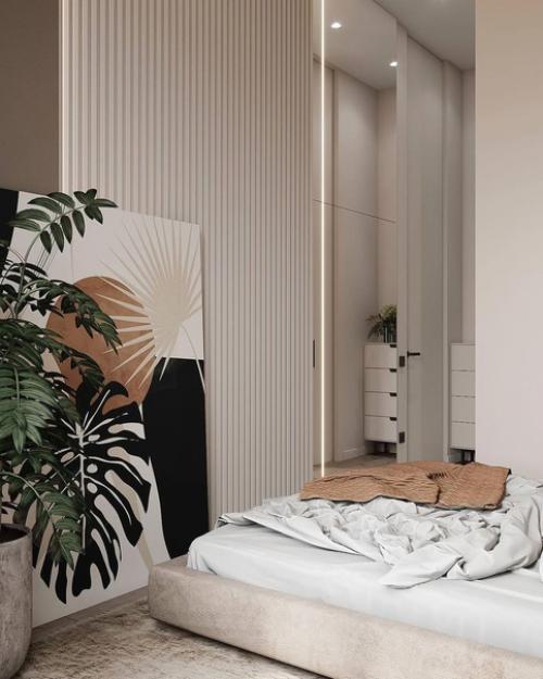 Лаконичный интерьер спальни с преобладанием различных оттенков коричневого. 02