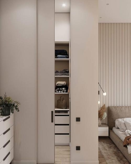 Лаконичный интерьер спальни с преобладанием различных оттенков коричневого. 05