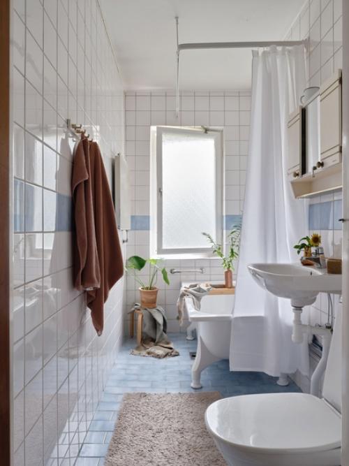 Подборка ванных комнат а скандинавском стиле, в которых тон всему интерьеру задает декор и текстиль. 03